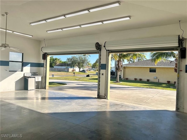 garage with ceiling fan