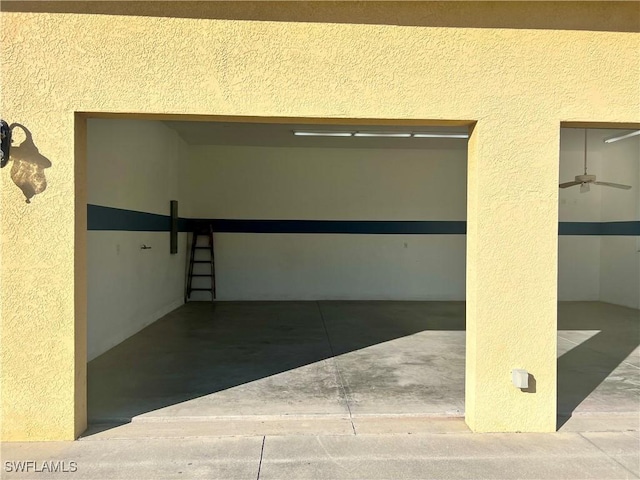 garage with ceiling fan