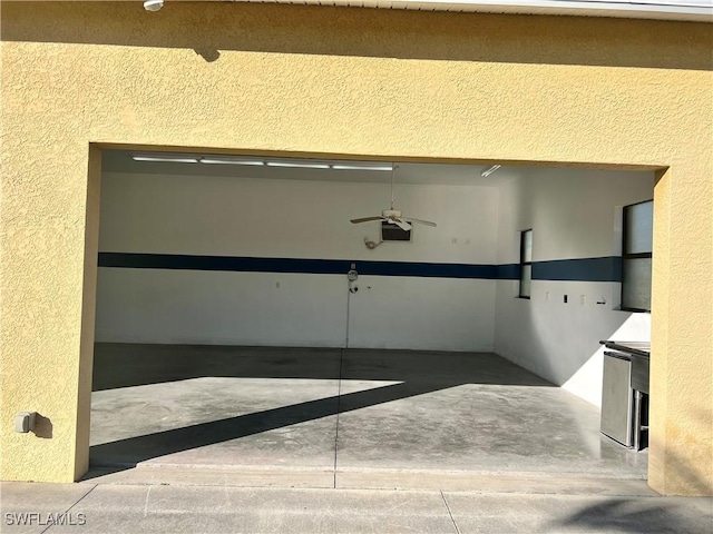 garage featuring ceiling fan