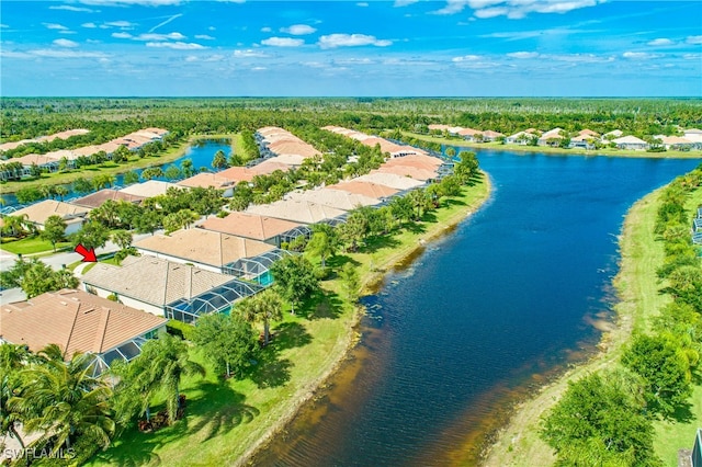 birds eye view of property featuring a water view