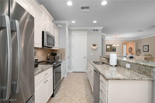 kitchen with an inviting chandelier, white cabinets, sink, ornamental molding, and stainless steel appliances