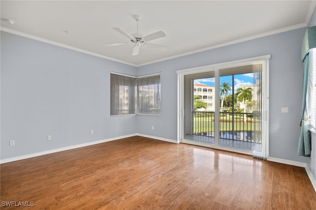 unfurnished room with ceiling fan, ornamental molding, and hardwood / wood-style floors