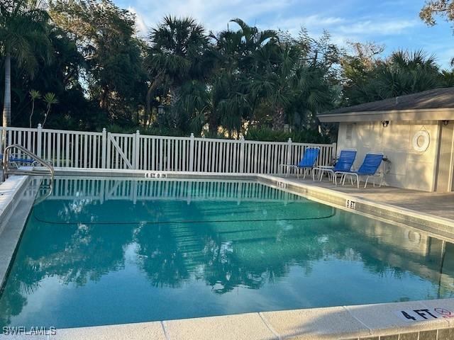 16679 Forest Blvd Unit 203, Fort Myers, FL 33908 - pool featuring fence and a patio area