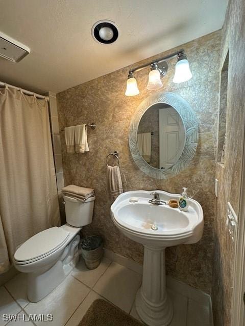 16679 Forest Blvd Unit 203, Fort Myers, FL 33908 - bathroom featuring toilet and tile patterned floors