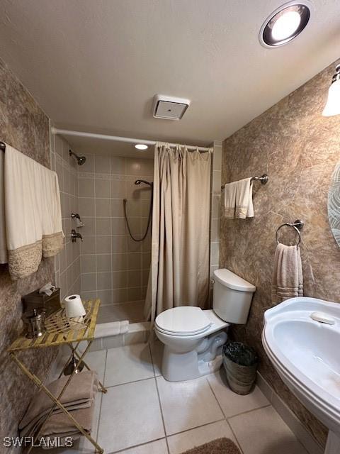 16679 Forest Blvd Unit 203, Fort Myers, FL 33908 - full bath with toilet, tile patterned floors, and tiled shower