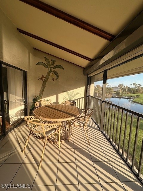 balcony featuring a water view