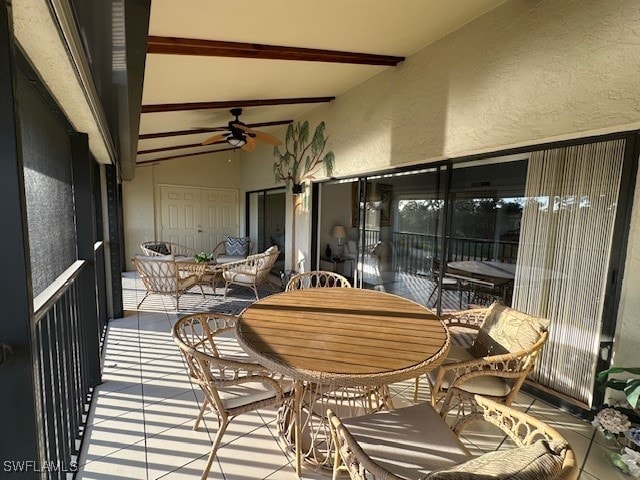 balcony featuring ceiling fan