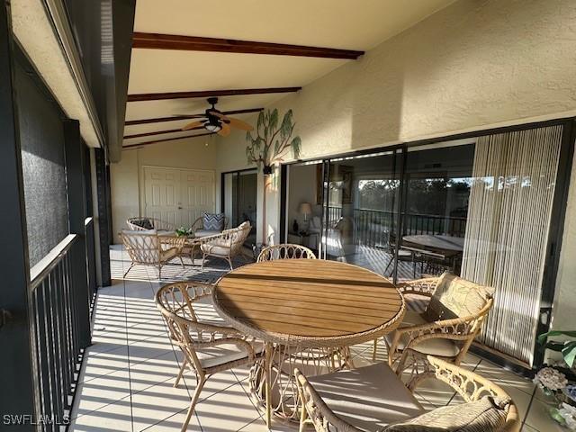 16679 Forest Blvd Unit 203, Fort Myers, FL 33908 - balcony featuring ceiling fan and outdoor dining area