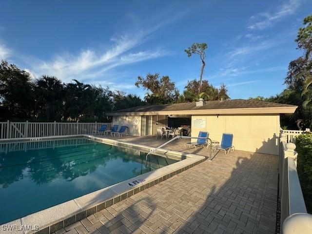16679 Forest Blvd Unit 203, Fort Myers, FL 33908 - pool with a patio area and fence