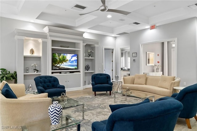 living room with ceiling fan, coffered ceiling, light hardwood / wood-style floors, and built in features