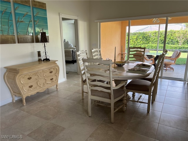 dining space featuring tile patterned flooring