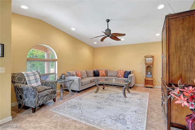 tiled living room featuring vaulted ceiling and ceiling fan