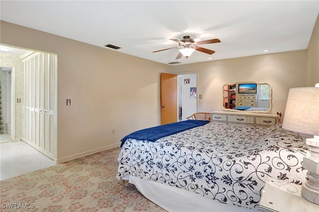 carpeted bedroom with ceiling fan