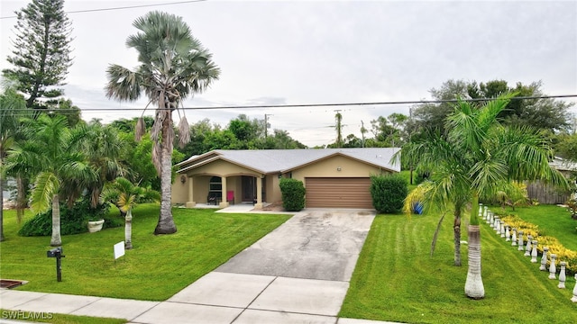 single story home featuring a front yard and a garage