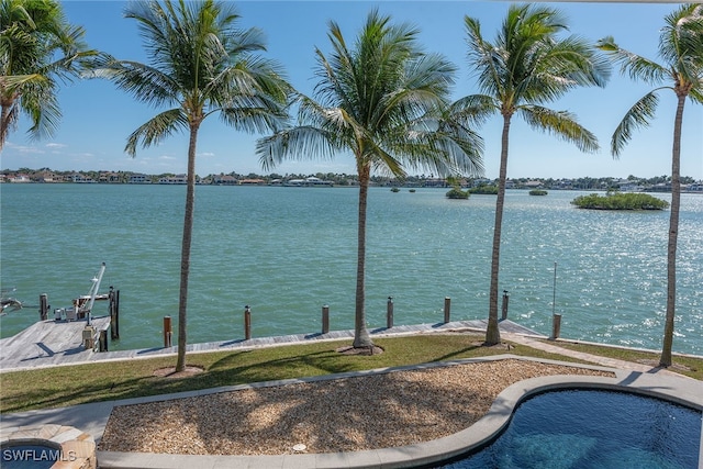 exterior space with a water view