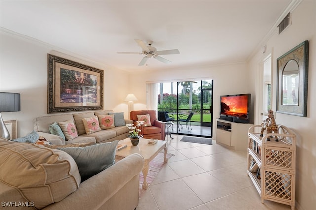 tiled living room featuring ceiling fan and crown molding