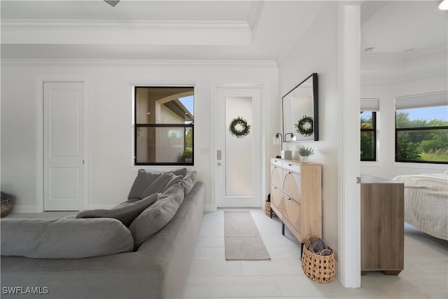 living room featuring light tile patterned flooring and crown molding