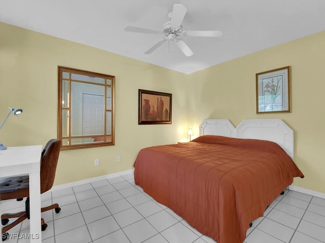 bedroom with ceiling fan and light tile patterned floors