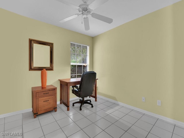 tiled office featuring ceiling fan