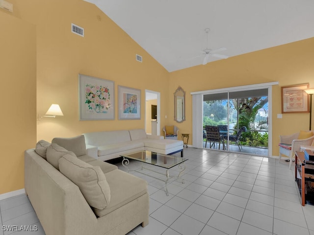 living room featuring ceiling fan, light tile patterned flooring, and high vaulted ceiling