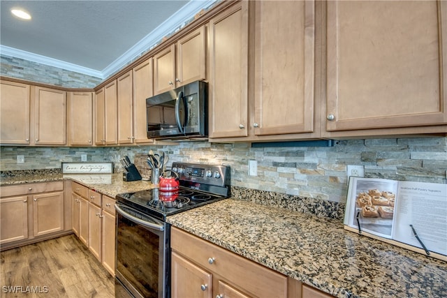 kitchen with black / electric stove, light stone counters, backsplash, crown molding, and light hardwood / wood-style flooring