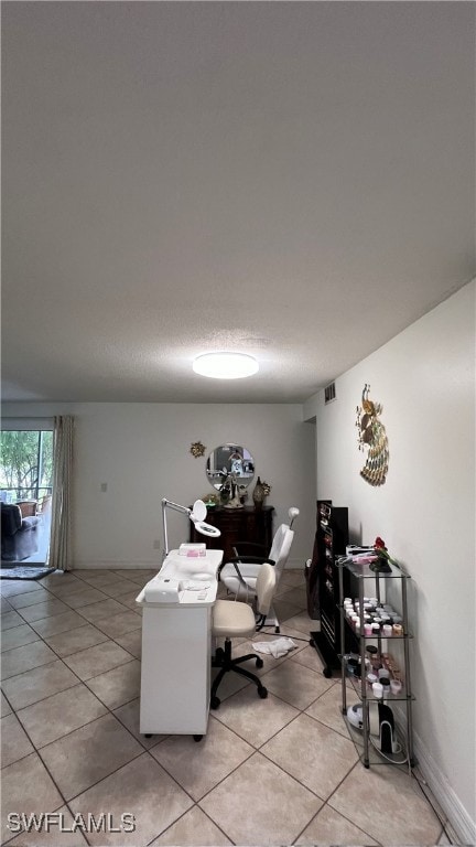 office space featuring light tile patterned floors