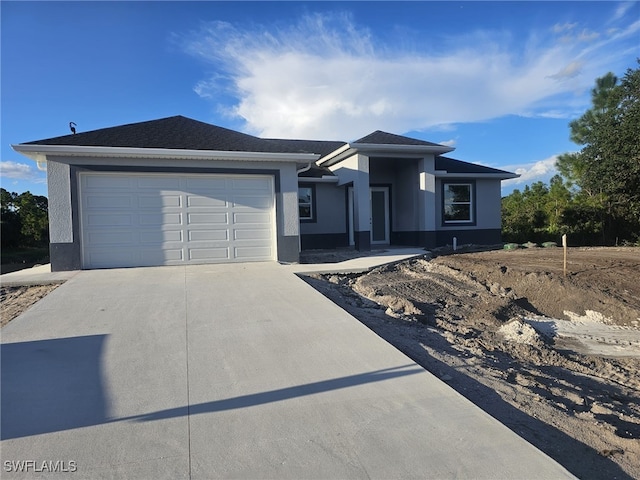 view of front of house with a garage