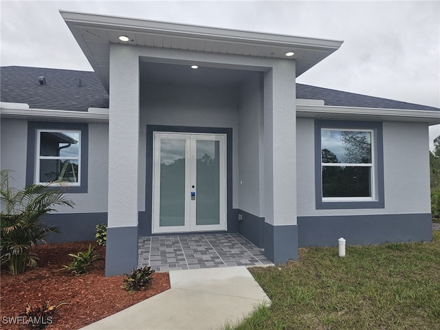 doorway to property with french doors