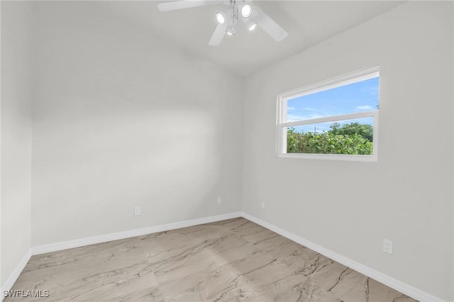 spare room with ceiling fan