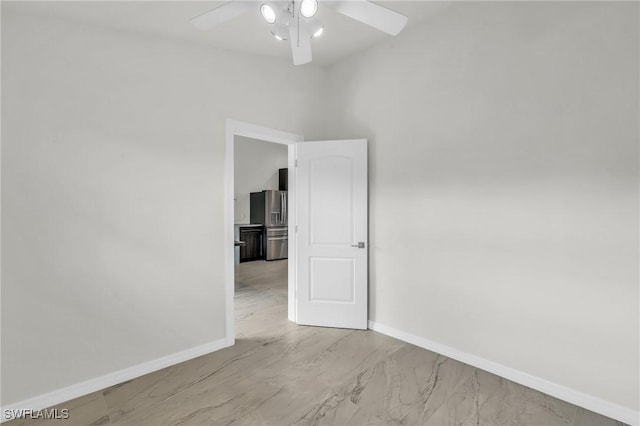 unfurnished room with ceiling fan