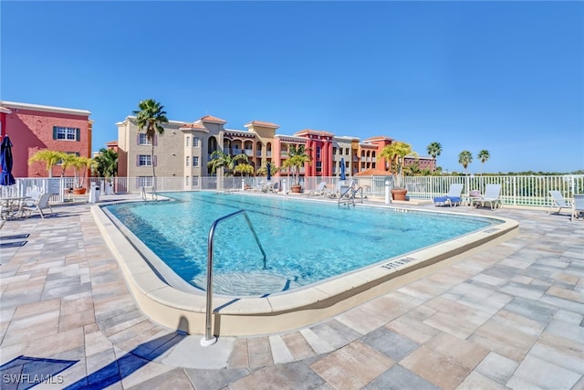 view of pool featuring a patio