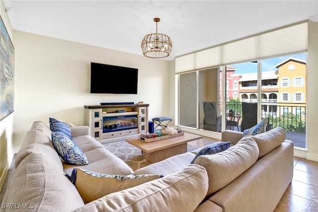 living room featuring a chandelier