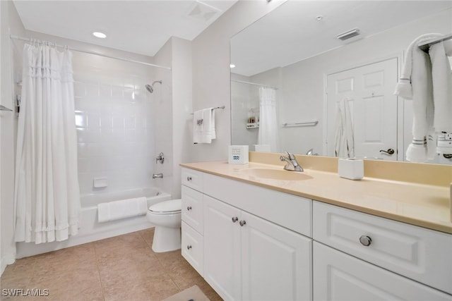 full bathroom with shower / bathtub combination with curtain, tile patterned flooring, vanity, and toilet