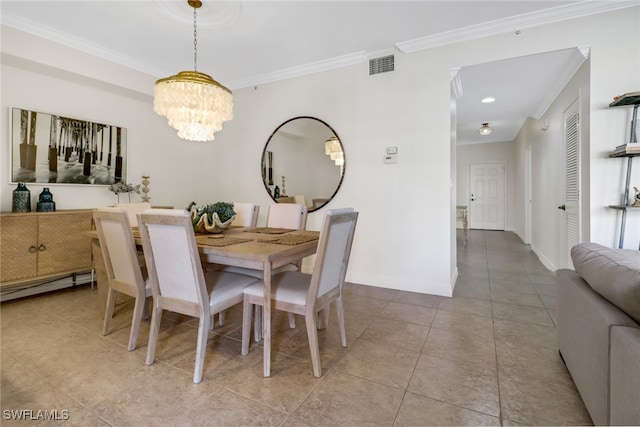 tiled dining area with an inviting chandelier, a baseboard heating unit, and crown molding