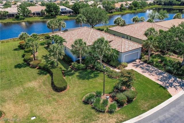 birds eye view of property featuring a water view