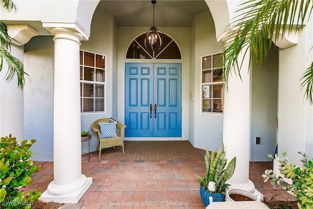 doorway to property featuring covered porch