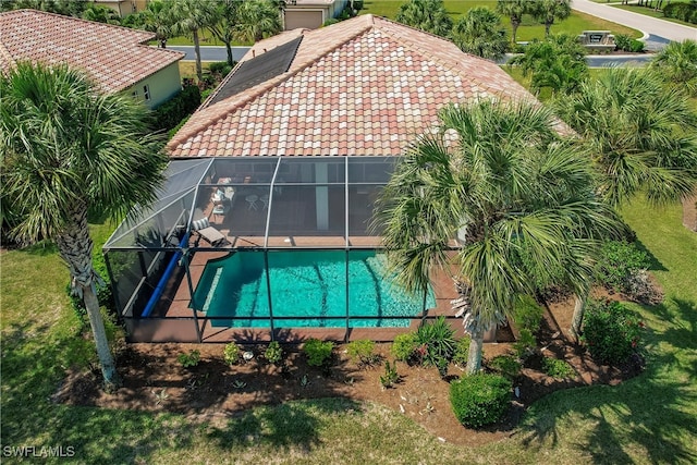 view of swimming pool with a lanai