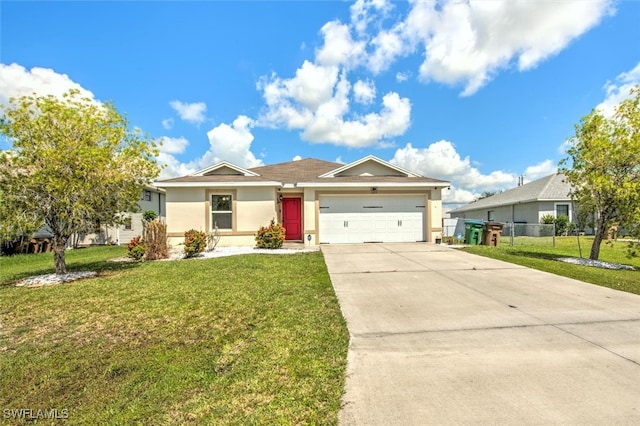 ranch-style house with a garage and a front yard