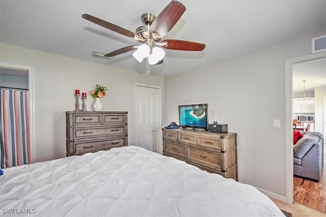 1225 SW 16th Ter, Cape Coral, FL 33991 - bedroom with baseboards, ceiling fan, and a closet