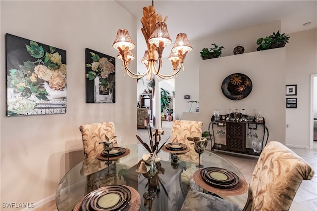 dining area with light tile patterned floors and a notable chandelier