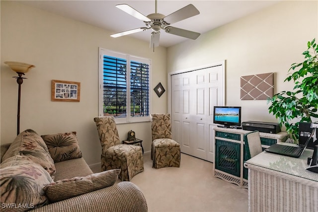 living room with ceiling fan and light carpet