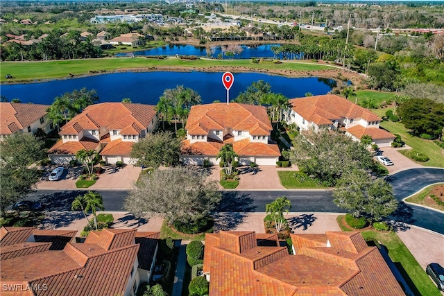 bird's eye view with a water view