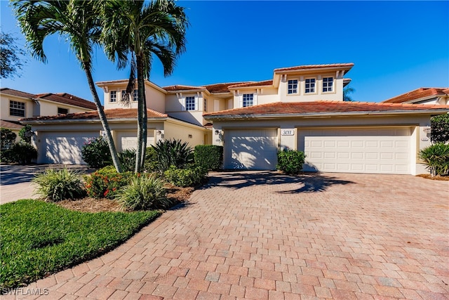 view of front of property featuring a garage