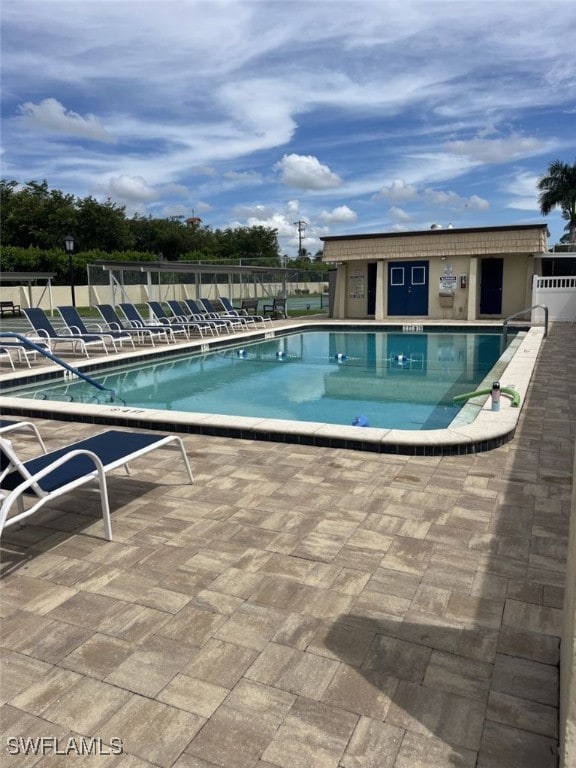 view of pool featuring a patio area