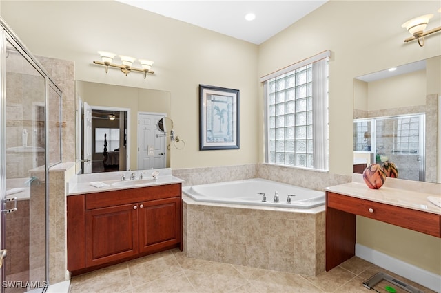 bathroom featuring independent shower and bath and vanity