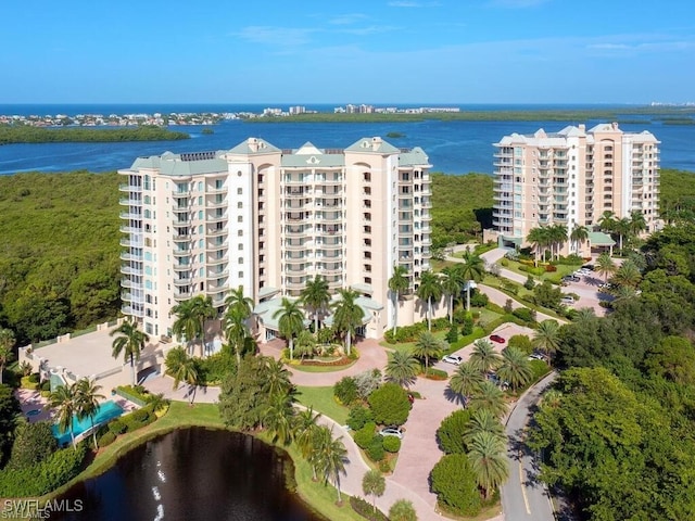 birds eye view of property featuring a water view