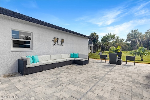 view of patio with an outdoor living space