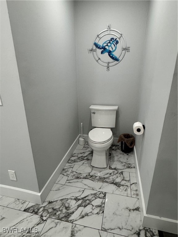 bathroom featuring toilet