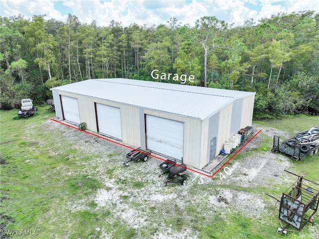 view of outdoor structure featuring a garage