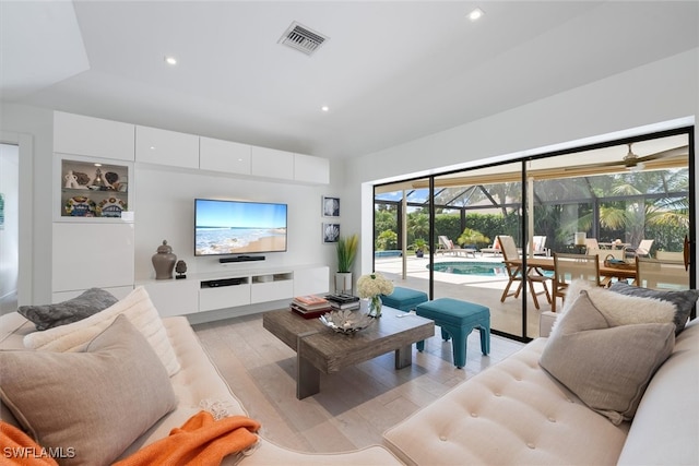 living room with light hardwood / wood-style floors